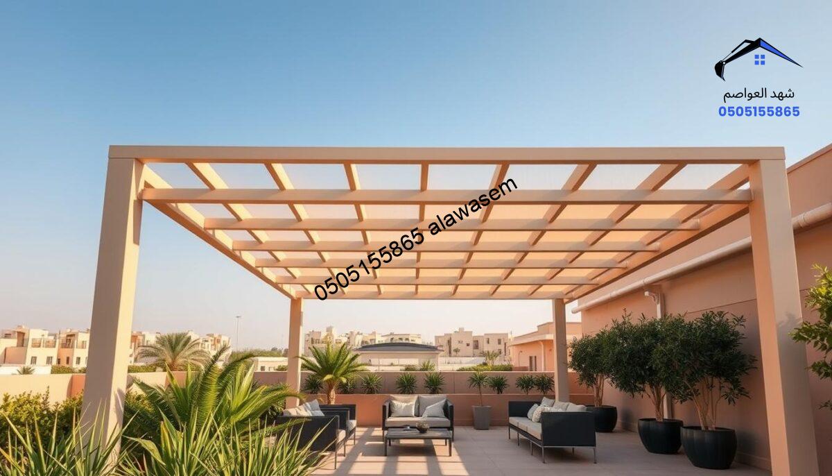 A modern outdoor pergola in Riyadh, designed to blend harmoniously with the local climate. In the foreground, showcase a beautifully structured pergola with a sleek, minimalist design, surrounded by lush greenery and comfortable seating. The middle ground features a sunny patio area with elegant outdoor furniture under the pergola, emphasizing shade and relaxation. In the background, depict a clear blue sky typical of Riyadh's weather, with distant sand-colored buildings reflecting the city's architectural style. Use warm, natural lighting to create a bright and inviting atmosphere, captured from a slightly elevated angle to highlight the pergola's design and functionality. The image should evoke a sense of modern comfort and aesthetic appeal while remaining serene and inviting.