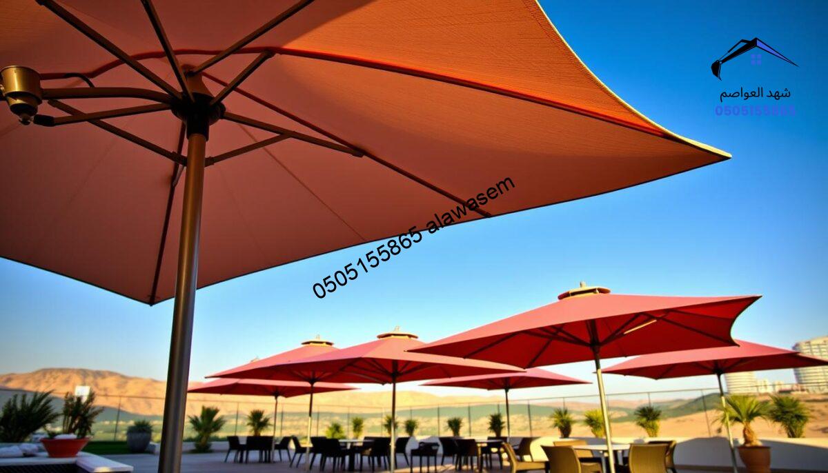 An elegant, modern outdoor setting featuring sleek PVC umbrellas in vibrant colors designed to withstand the climate of Riyadh. In the foreground, a large, stylish PVC umbrella opens wide, showcasing its intricate design and durability. The middle ground displays a beautifully arranged patio with tables and chairs underneath the umbrella, creating an inviting atmosphere. The background features a clear blue sky typical of Riyadh with a hint of desert landscape. The scene is bathed in warm, golden sunlight, casting soft shadows and enhancing the colors of the umbrellas. The overall mood conveys a relaxed, sophisticated ambiance, perfect for outdoor gatherings in a contemporary urban environment.
