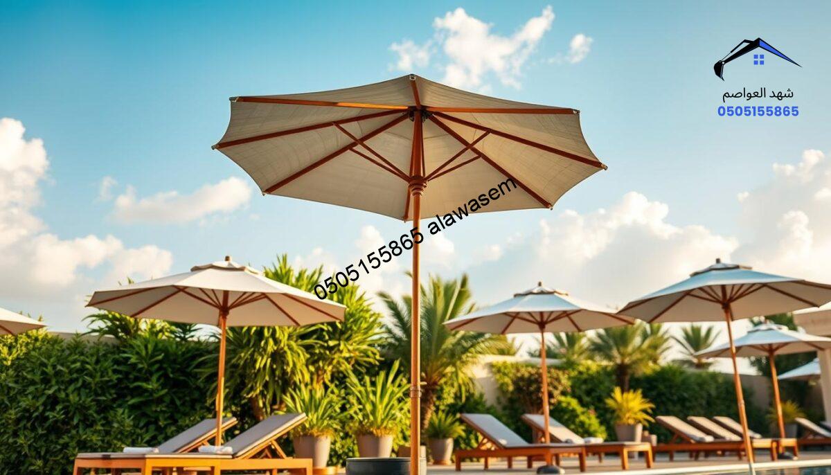 A serene outdoor poolside scene in Riyadh featuring eco-friendly umbrellas made from sustainable materials like bamboo and recycled fabrics. In the foreground, several elegantly designed umbrellas shield lounge chairs, showcasing a variety of colors and textures that harmonize with nature. The middle ground displays lush greenery and potted plants, enhancing the eco-friendly theme. In the background, a bright blue sky with soft, fluffy clouds reflects the inviting atmosphere. The lighting is warm and natural, evoking a peaceful afternoon. The angle captures the umbrellas from a slightly elevated perspective, providing depth and context to the outdoor setting. The overall mood is calm and inviting, highlighting the commitment to sustainability in umbrella design.